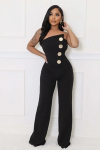 Detail of the chic strapless jumpsuit with four decorative gold buttons and wide legs