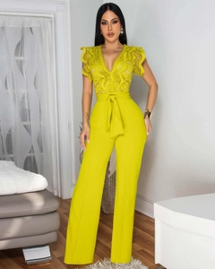 Detail of the high-waisted wide-leg jumpsuit with v-neck lace bodice and cap sleeves