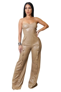 Detailed view of khaki PU leather jumpsuit with thin straps and metal side buttons