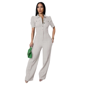 Detail of light gray short-sleeve jumpsuit with lapel collar and waist-tight design