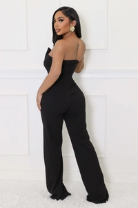 Side view of slim fit black strapless jumpsuit featuring elegant straight leg cut