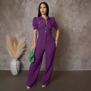 Detail of purple short-sleeve jumpsuit with lapel collar and wide-leg trousers design