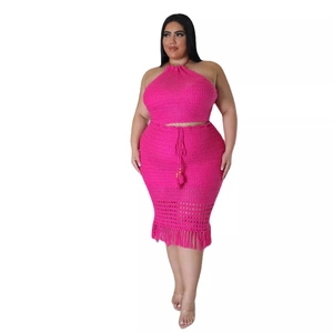 Women's plus size rose pink crochet two-piece set with halter top and fringe midi skirt