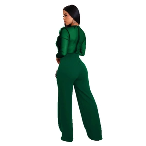 Women's dark green long sleeve jumpsuit with mesh splicing and ruffled details