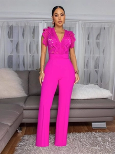Women's rose red lace jumpsuit featuring a deep V-neck and elegant wide-leg trousers