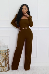Detail view of brown wide-leg jumpsuit with choker neck and gold chain waist belt