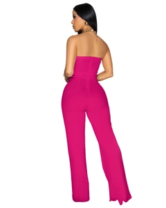 Rear view of rose red strapless jumpsuit featuring back zipper and slim fit design