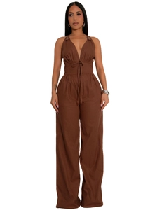 Detail of deep brown halter neck jumpsuit with drawstring waist and wide leg cut