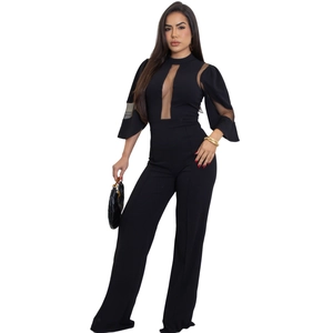 Combinaison élégante pour femme avec jambe large, empiècement mesh et coupe cintrée