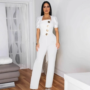 Elegant white square neck jumpsuit with puff sleeves and decorative gold buttons