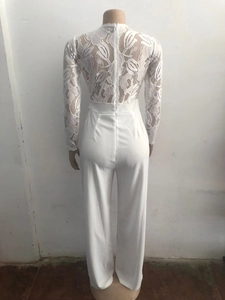 Detailed back view of white lace floral bodice and high-waisted wide-leg jumpsuit