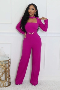 Detail view of magenta wide-leg jumpsuit with choker neck and gold chain belt waist