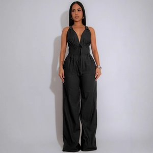 Sleeveless backless black wide-leg jumpsuit with deep V-neck and waist tie for women