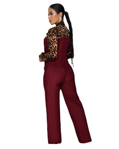 Detail showing elegant leopard print high neck and wine red wide leg jumpsuit design