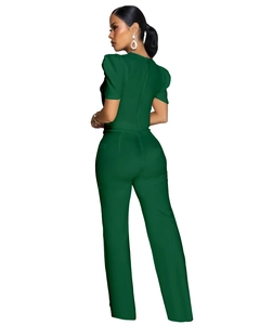 Detail view of the back of a dark green short sleeve jumpsuit with an invisible zipper