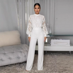 Elegant white lace long sleeve wide leg jumpsuit with hollow out floral details