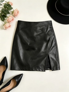 Women's black PU leather mini skirt with high waist and side slit in minimalist style