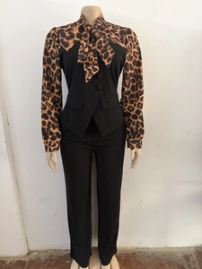 Detail of leopard print patchwork neckline and elegant bow tie on this chic women's set