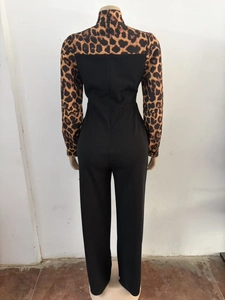 Detailed back view of leopard print patchwork jumpsuit with hidden zipper closure