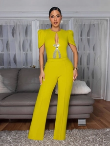 Lime green two-piece set with puff sleeves, rhinestone bow cutout and wide-leg pants