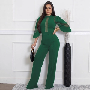 Combinaison élégante vert foncé à jambes larges avec empiècements en tulle et col montant