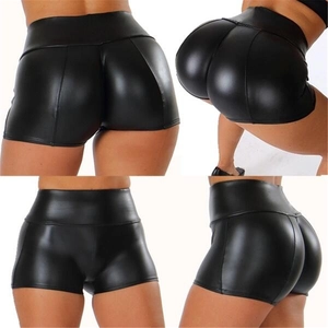 Detail view of black high-waisted PU leather shorts with slim fit and lifting effect