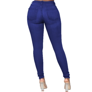 Detail view of the back pockets and slim fit design of royal blue high waist jeans