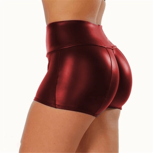 Detail view of the deep red shiny PU leather hot pants with back scrunch design