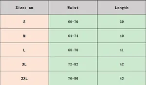 Size guide for high waisted PU pleated mini skirt with measurements in cm for S to 2XL