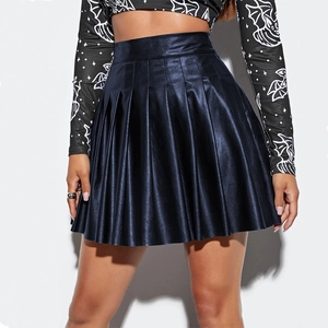 Detailed close-up of high-waist pleated mini skirt in navy blue metallic PU leather fabric
