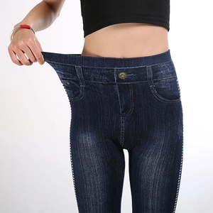Women high waisted dark blue denim print jeggings showing high elasticity waist stretch