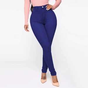 Women's high waist skinny jeans in electric blue with a single silver metal button