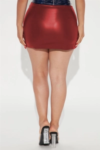 Close-up of the red metallic PU leather mini skirt with a tight fit and glossy finish