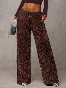 Detail of high-waist brown sequin wide-leg pants with adjustable drawstring waist