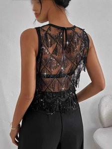 Haut de fête noir sans manches avec paillettes, glands et dos ouvert en maille géométrique