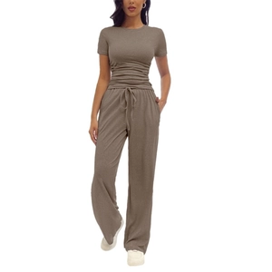 Detail view of the drawstring waist and textured fabric on this stylish brown lounge set