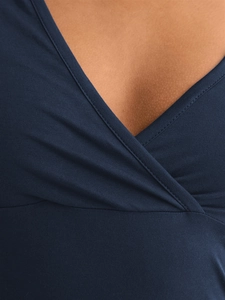 Close-up of a deep blue V-neck slim-fit T-shirt with high-quality knit texture
