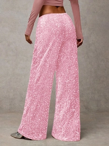 Detail shot of sparkling pink sequin wide-leg trousers for a stylish party look