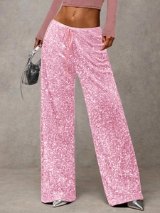Close-up of bright pink sequin wide-leg pants with drawstring waist for party fashion