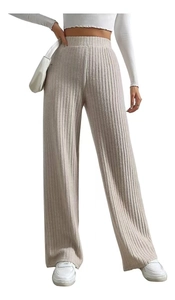 Detail of oatmeal ribbed knit wide-leg pants showing high waist and texture