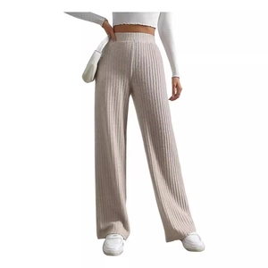High-waisted beige ribbed knit wide leg trousers with elastic waistband for women