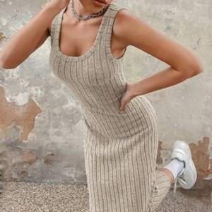 Slim fit rib-knit midi dress with round neck and side slit in earthy brown tone