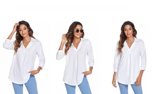 Detail of white V-neck shirt showing soft fabric texture and pleated chest design