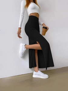 Elegant high-waisted black ribbed knit maxi skirt with side slit for women
