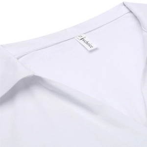 Close-up of white V-neck shirt collar showing detailed woven texture and branded tag