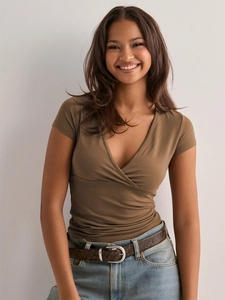 Close-up detail of walnut brown wrap V-neck T-shirt with slim fit knitted texture