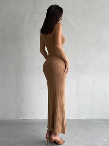 Detailed texture of ribbed knit fabric on a slim-fit sleeveless tan midi dress for women