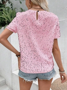 Detail of pink sequin T-shirt featuring back cutout with button closure for women