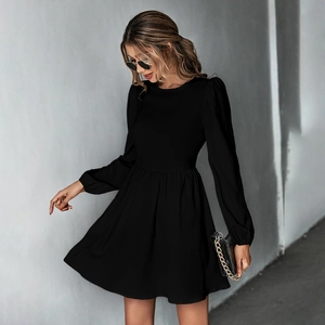 Detail of elegant black puff sleeve mini dress with a high waist and A-line skirt