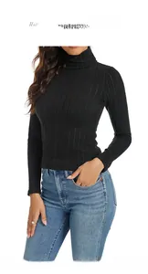Close-up of women's black turtleneck top featuring ribbed knit texture and slim fit design